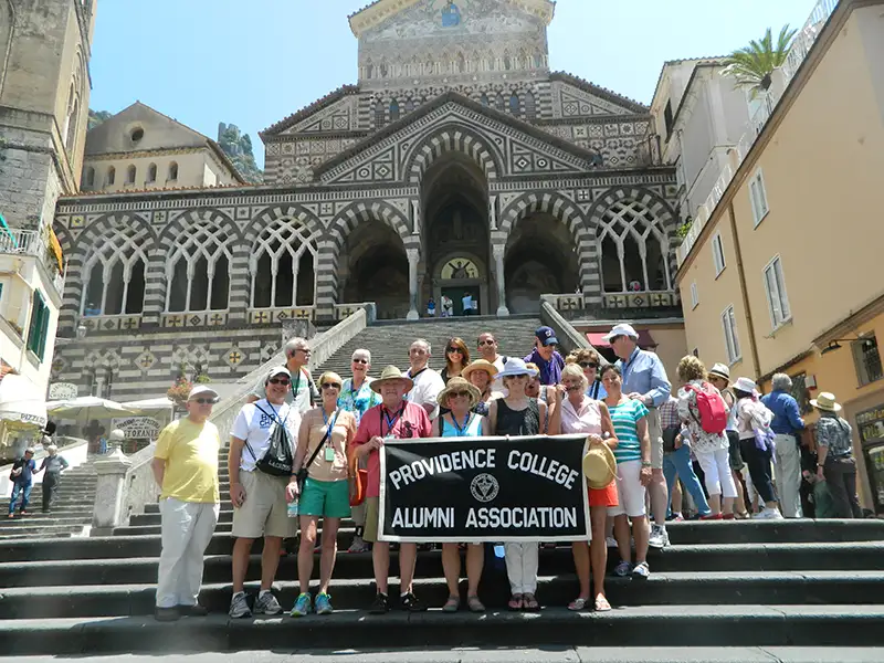 group photo on steps of Italy