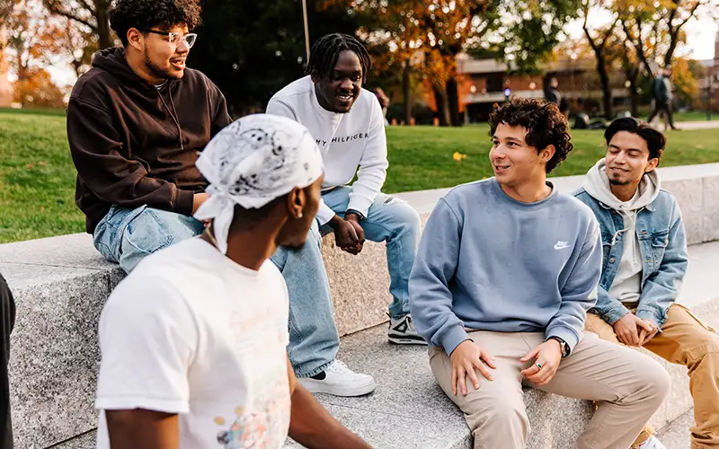 Group of students sitting outside