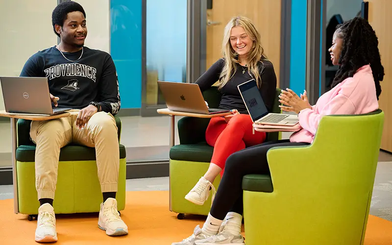 students sitting in mondor center